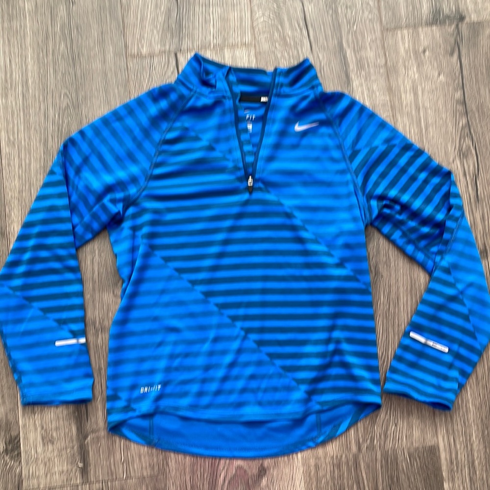 Youth medium Nike running 3/4 zip pull over.
